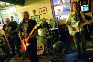 Tres Hombres perform at The Cross Inn. Caldicot. Andy Berry, lead guitar and vocals, Rob Bennett, bass guitar, Graeme " Lennie " Jones, drums, John Morris, lead guitar and vocals, and Paul Powell, sax and vocals. © Roger Donovan, Media Photos Tel: 02920 361126 Mobile: 07711 325100 e-mail: roger@mediaphotos.co.uk www.mediaphotos.co.uk All Moral Rights Reserved including the right to be identified as the creator of this copyright protected image.